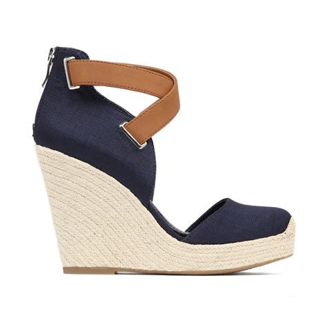 navy blue suede wedge shoes.